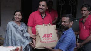 Neeraj Akhoury - MD and CEO - ACC Cement handing over relief materials in Kerala flood relief