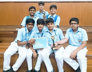 Students of Blue Bells Public School with Industrial Design Championship Trophy and certificate