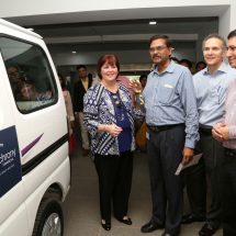 Ms Margaret Keane SynchronyFinancial Handing the Key of Van to LVPEI
