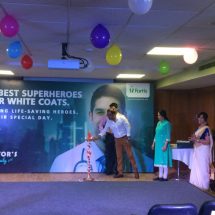 Dr Murali Chakravarty lighting the lamp with Dr Gayatri Kamath and Mr Raj Gore beside