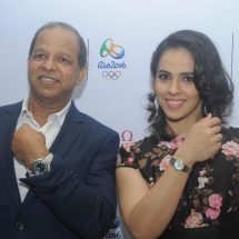 PH Narayanan - Brand Manager of OMEGA India and Saina Nehwal posing in Omega constellation watch