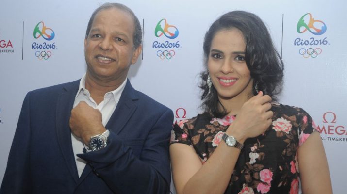 PH Narayanan - Brand Manager of OMEGA India and Saina Nehwal posing in Omega constellation watch