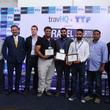 Winners of Travel Startup Knockdown with the winners and judges
