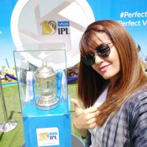 Actress Surveen Chawla clicks a selfie with the VIVOIPL trophy