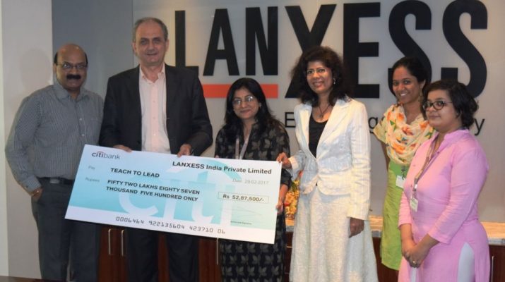 Dr Jacques Perez - MD and Country Representative - LANXESS handing over the cheque to Dimple Gujral CFO - Teach For India at LANXESS House