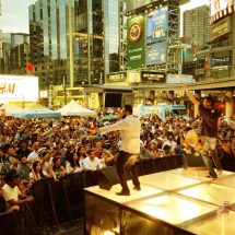 Inder Kooner - vocalist and Karm Cooner - dhol of En Karma during a live stage performance