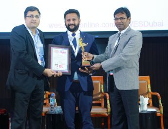 Naveen KM - MD Trio World Academy receiving award for Global Collaborative Learning Environments at World Education Summit Dubai