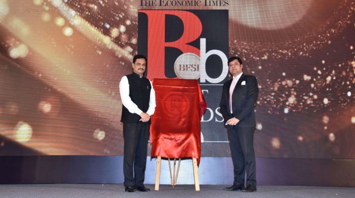 Dr Ranjit Patil - Minister of State Home - unveils book - The Economic Times Best BFSI Brands Coffee Table book