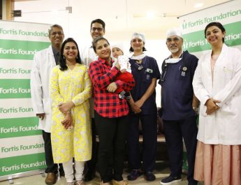 Umeed-Smile - Doctors team and members from Fortis Foundation with Baby Vedika post her surgery