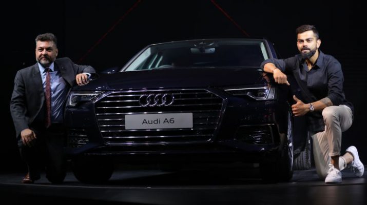 Virat Kohli - captain of Indian cricket team with Balbir Singh Dhillon - Head of Audi India with the new Audi A6