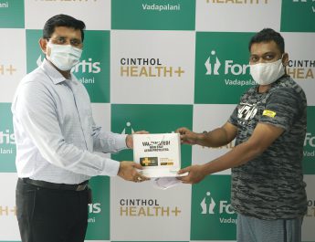A person getting post-vaccine sensitization kit by Fortis Hospital Staff